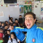 Danny with children in Ecuador