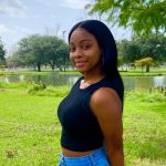 Jazzmin Duncan with green field in background