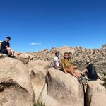 Abby and 3 friends on boulders